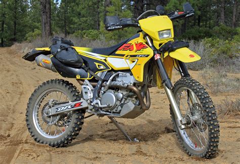 Drz 400 horsepower - A compact design, 398cc, DOHC, liquid-cooled, dry-sump engine produces strong low-rpm power. Its compact, four-valve cylinder head features large 36mm intake valves and …